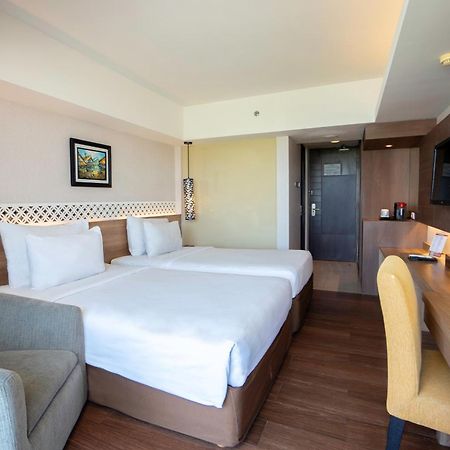 מלון סמיניאק Ramada By Wyndham Bali Sunset Road Kuta מראה חיצוני תמונה